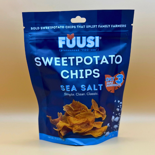 Blue package of Fuusi Sweetpotato Chips with sea salt on a beige background